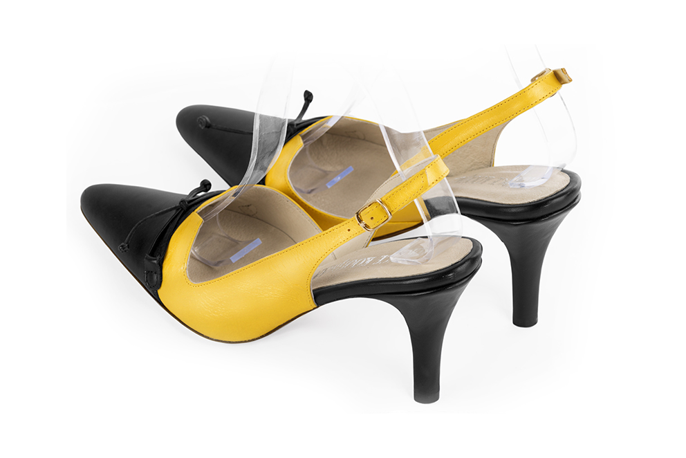 Satin black and yellow women's open back shoes, with a knot. Tapered toe. High slim heel. Rear view - Florence KOOIJMAN